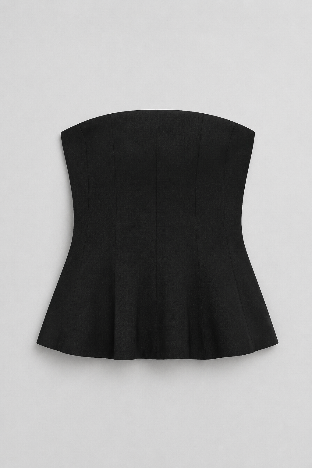 Strapless Corset Top with Flared Hem in Black, flat lay