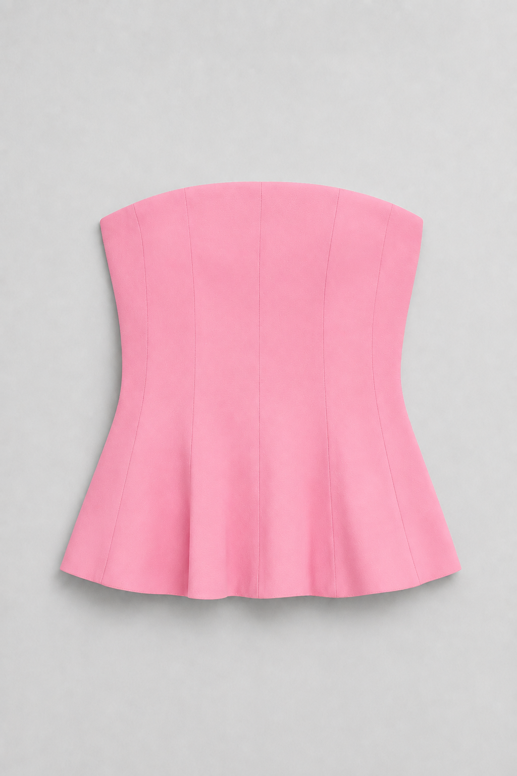 Strapless Corset Top with Flared Hem in Pink, flat lay