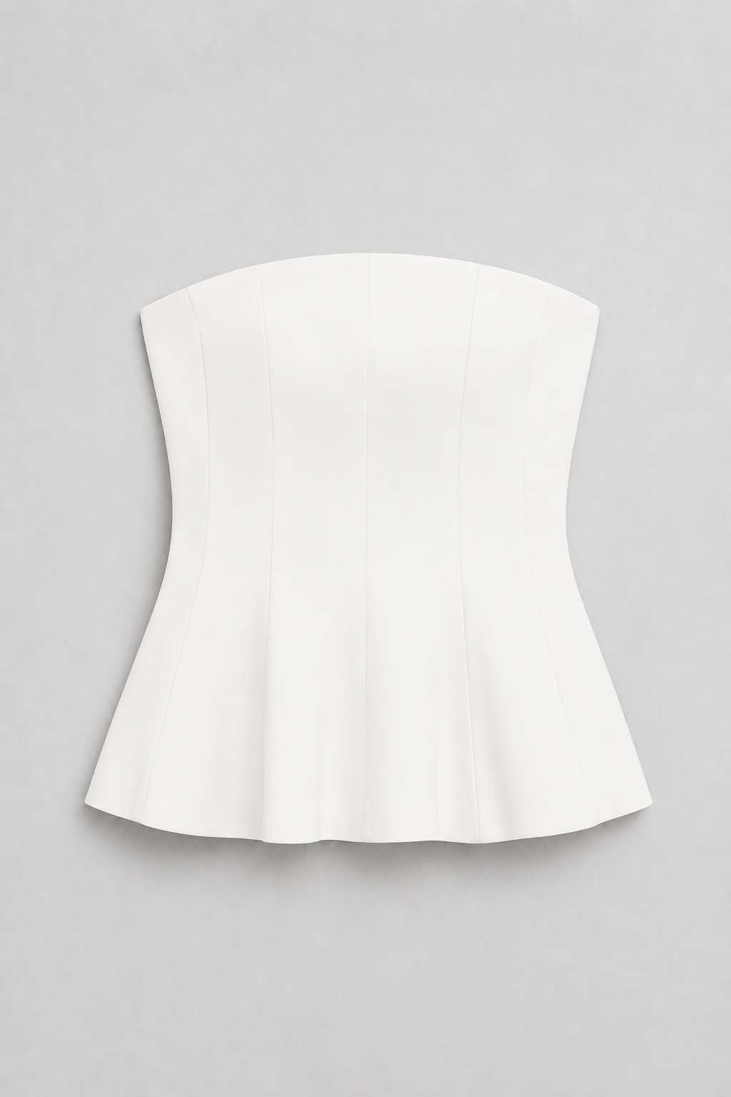 Strapless Corset Top with Flared Hem in White, flat lay