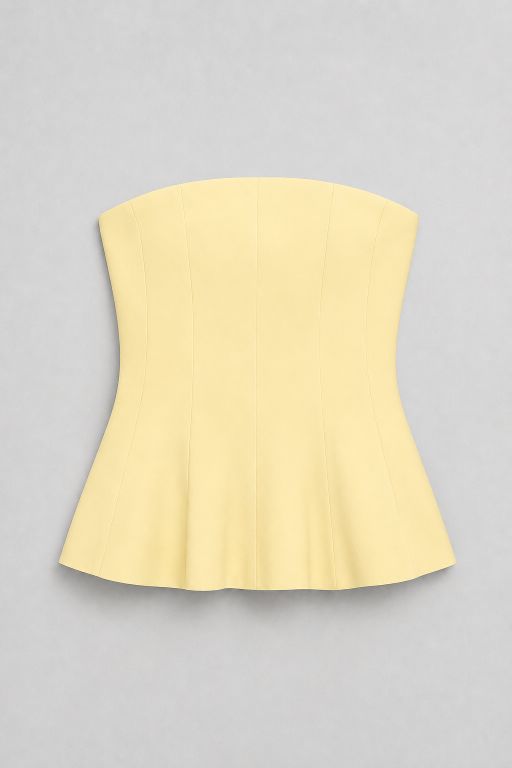 Strapless Corset Top with Flared Hem in Yellow, flat lay